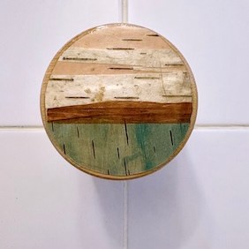 birch bark on bamboo lid on a jar